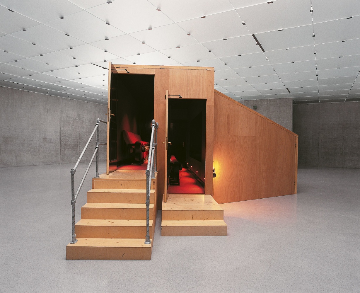 Janet Cardiff and George Bures Miller
Paradise Institute, 2001
Mixed Media
Duration: 13 minutes
200 3/4 x 43 1/3 x 118 inches
(510 x 110 x 300 cm)