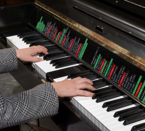  The Instrument of Troubled Dreams, hands at piano